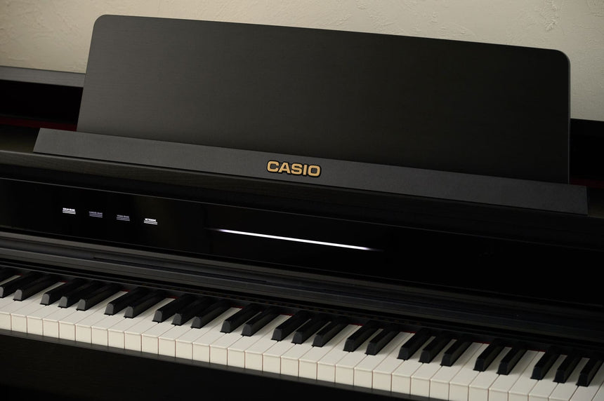 Casio AP-750BK digital piano in black – oblique view of the front panel and keyboard.