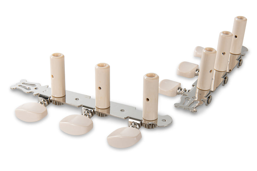GEWA F&S nickel-plated classical guitar tuning machine set with lyre plates and six white buttons, angled view.