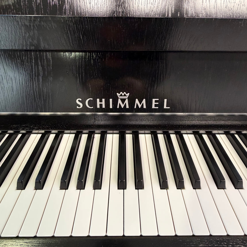 SCHIMMEL Klavier 112/5 E eiche schwarz Occasion Bj. 1989, Silver Edition, sehr guter Zustand Renner Mechanik (gebraucht)