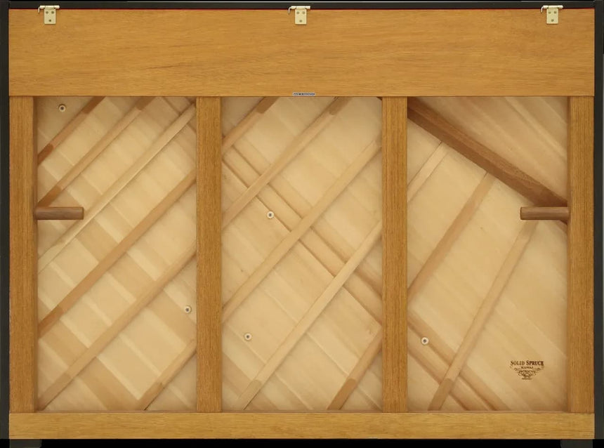 Kawai K-15 E upright piano in polished ebony – rear view showing the soundboard and black cabinet edges.